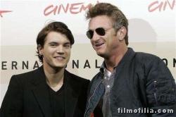 Movie director Sean Penn poses with actor Emile Hirsh