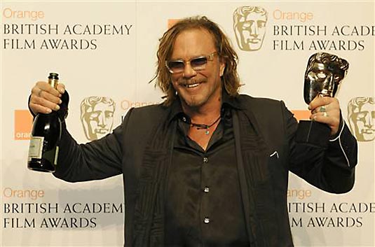 Mickey Rourke poses after winning the award for Leading Actor for “The Wrestler” during the 2009 BAFTA (British Academy of Film and Television Arts) awards ceremony at the Royal Opera House in London February 8, 2009.