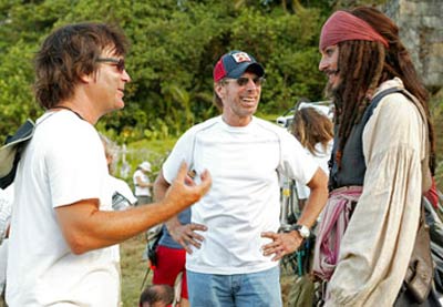 Gore Verbinski, Jerry Bruckheimer and Johnny Depp on the set of Pirates of the Caribbean