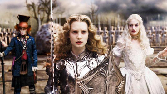 Johnny Depp (The Mad), Mia Wasikowska (Alice Kingsley) and Anne Hathaway (The White Queen) in Alice in Wonderland