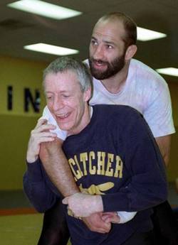 John E.du Pont (left) with Dave Schultz at Foxcatcher wrestling facility