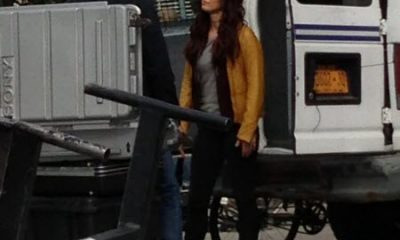 Megan-Fox as April O'Neil, sporting yellow jacket