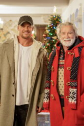 The Man With the Bag Alan Ritchson and Arnold Schwarzenegger